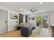 Modern living room with sliding door to a private patio at 7925 E Keim Dr, Scottsdale, AZ 85250