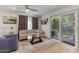 Comfortable living room with sliding door access to a private patio at 7925 E Keim Dr, Scottsdale, AZ 85250