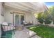 Private patio with pergola, artificial turf, and comfortable seating at 7925 E Keim Dr, Scottsdale, AZ 85250