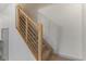 Modern staircase with light wood and stainless steel accents at 7925 E Keim Dr, Scottsdale, AZ 85250