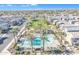 Aerial view of community pool, park and homes at 8235 E Impala Ave, Mesa, AZ 85209