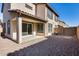 Backyard with gravel and access to patio at 1255 N Arizona Ave # 1276, Chandler, AZ 85225