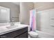 Bathroom with tub shower combo and updated vanity at 1255 N Arizona Ave # 1276, Chandler, AZ 85225