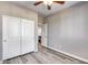 Bedroom with double door closet and wood-look floors at 1255 N Arizona Ave # 1276, Chandler, AZ 85225