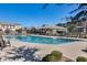 Inviting community pool with lounge chairs at 1255 N Arizona Ave # 1276, Chandler, AZ 85225
