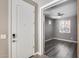 Entryway with white door leading to an office at 1255 N Arizona Ave # 1276, Chandler, AZ 85225