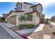 Townhome exterior with attached garage and landscaping at 1255 N Arizona Ave # 1276, Chandler, AZ 85225