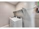 Laundry room with washer, dryer and shelving at 1255 N Arizona Ave # 1276, Chandler, AZ 85225