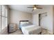 Well-lit bedroom with a double bed, updated flooring and a large closet at 15420 N 160Th Ln, Surprise, AZ 85374