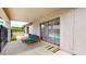 Relaxing covered patio with seating and view of pool at 15420 N 160Th Ln, Surprise, AZ 85374