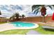 Relaxing kidney shaped pool with lush landscaping at 15420 N 160Th Ln, Surprise, AZ 85374