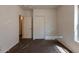 Simple bedroom with double door closet and carpet at 15818 N 25Th St # 115, Phoenix, AZ 85032