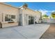 Private patio with stone feature wall and French doors at 1610 N Stapley Dr # 104, Mesa, AZ 85203