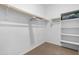 Spacious closet with hanging rods and shelves at 1793 N Westfall Ln, Casa Grande, AZ 85122