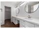 Modern bathroom with double vanity and walk-in shower at 23957 W Tonto St, Buckeye, AZ 85326