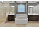 Double vanity bathroom with soaking tub and walk-in shower at 2522 W Brisa Dr, Phoenix, AZ 85085