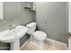 Clean bathroom with pedestal sink and toilet at 2522 W Brisa Dr, Phoenix, AZ 85085