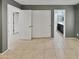 Spacious bedroom with tile flooring and access to bathroom at 2522 W Brisa Dr, Phoenix, AZ 85085