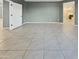 Bright bedroom with tile floors and access to bathroom at 2522 W Brisa Dr, Phoenix, AZ 85085