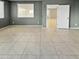 Spacious bedroom with large window and access to another room at 2522 W Brisa Dr, Phoenix, AZ 85085