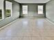 Living room with tile floors and multiple windows at 2522 W Brisa Dr, Phoenix, AZ 85085