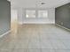 Open living area with tile floors and high ceilings at 2522 W Brisa Dr, Phoenix, AZ 85085