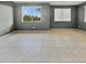 Large living area with tile floors and neutral walls at 2522 W Brisa Dr, Phoenix, AZ 85085