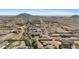 Aerial view showing house, distant mountains, and surrounding area at 28919 N 153Rd Ave, Surprise, AZ 85387