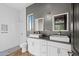 Elegant bathroom with double vanity and white subway tile at 28919 N 153Rd Ave, Surprise, AZ 85387