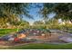 Modern playground with climbing structures and slides at 31752 N 116Th Dr, Peoria, AZ 85383