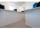 Spacious walk-in closet with ample shelving and hanging space at 31752 N 116Th Dr, Peoria, AZ 85383