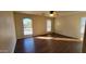 Bright bedroom with laminate flooring and arched windows at 3555 S Payton St, Mesa, AZ 85212