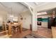 Bright dining area with wooden table and chairs, adjacent to kitchen at 4201 E Camelback Rd # 70, Phoenix, AZ 85018