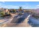 Grand community entrance with palm trees and gated access at 4777 S Fulton Ranch Blvd # 2122, Chandler, AZ 85248