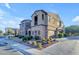 Two-story home with stone and stucco exterior, attached garage, and landscaping at 4777 S Fulton Ranch Blvd # 2122, Chandler, AZ 85248