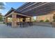 Outdoor patio with pergola, fireplace, and seating at 4777 S Fulton Ranch Blvd # 2122, Chandler, AZ 85248