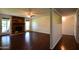 Spacious living room featuring a brick fireplace and hardwood floors at 660 N Oracle St, Mesa, AZ 85203