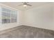 Spacious bedroom with large window and neutral carpeting at 6850 E Mcdowell Rd # 26, Scottsdale, AZ 85257