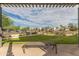 Well-maintained community lawn with a bench at 6850 E Mcdowell Rd # 26, Scottsdale, AZ 85257