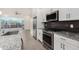 Modern kitchen with stainless steel appliances and granite countertops at 6850 E Mcdowell Rd # 26, Scottsdale, AZ 85257