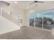 Modern living room with sliding glass doors to balcony at 6850 E Mcdowell Rd # 26, Scottsdale, AZ 85257
