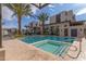 Community pool and spa with lounge chairs at 6850 E Mcdowell Rd # 26, Scottsdale, AZ 85257