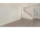 Modern staircase with metal railing leading to upper level at 6850 E Mcdowell Rd # 26, Scottsdale, AZ 85257