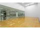 Indoor racquetball court with glass partition separating it from a fitness center at 7161 E Rancho Vista Dr # 3001, Scottsdale, AZ 85251