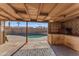 Covered patio overlooks refreshing pool with built-in bar at 7323 E Lewis Ave, Scottsdale, AZ 85257