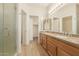 Bathroom features double vanity and granite countertop at 9772 E Tranquility Way, Sun Lakes, AZ 85248