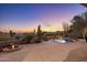 Desert landscape with a fire pit, pool, and mountain views at 10040 E Happy Valley Rd # 2046, Scottsdale, AZ 85255