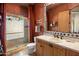 Bathroom with shower, toilet, vanity, and decorative tile at 10040 E Happy Valley Rd # 2046, Scottsdale, AZ 85255