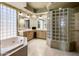 Spa-like bathroom with soaking tub, walk-in shower, and dual sinks at 10040 E Happy Valley Rd # 2046, Scottsdale, AZ 85255