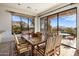 Elegant dining room with large windows and mountain views at 10040 E Happy Valley Rd # 2046, Scottsdale, AZ 85255